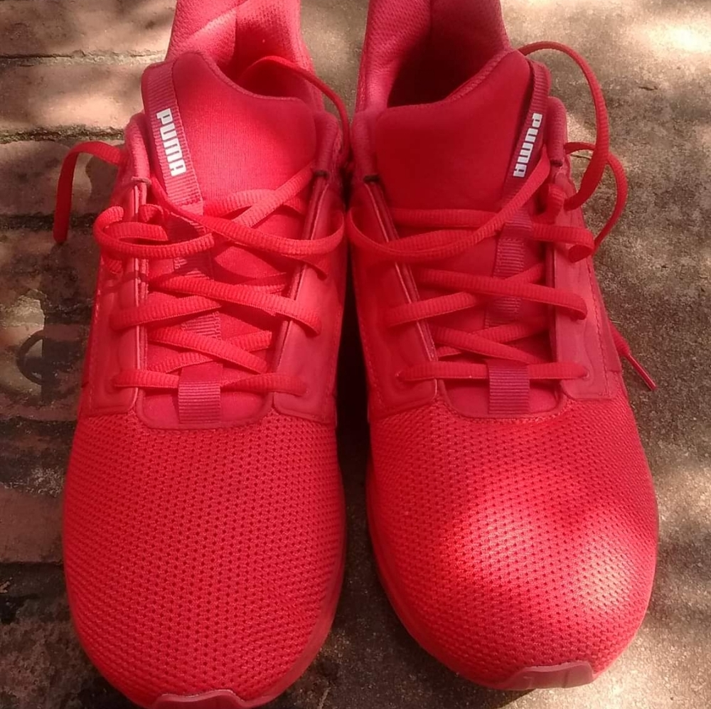 Men's red Puma shoes